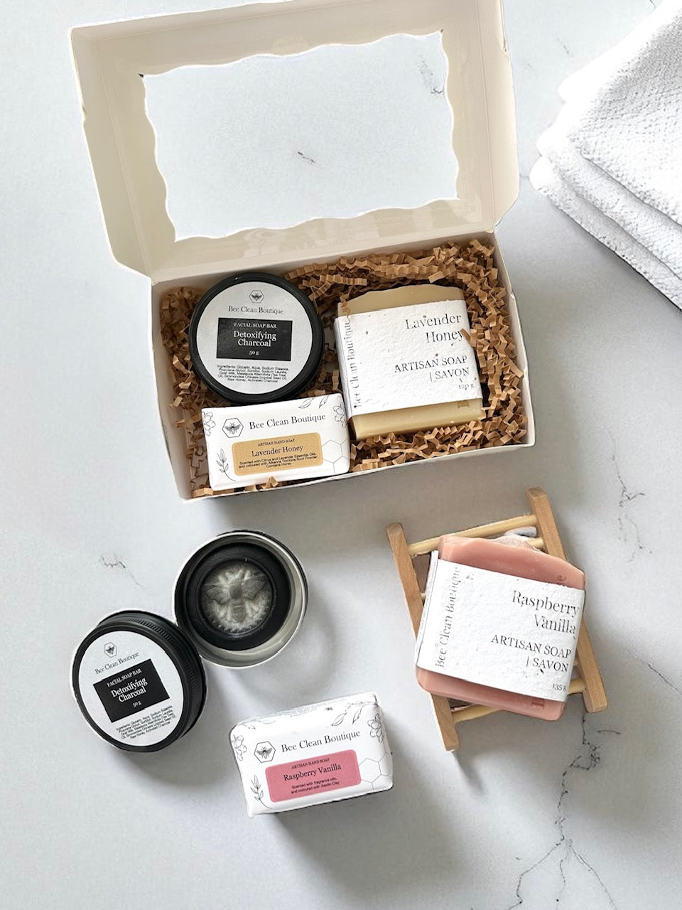 Artisan soap bundles on a marble countertop