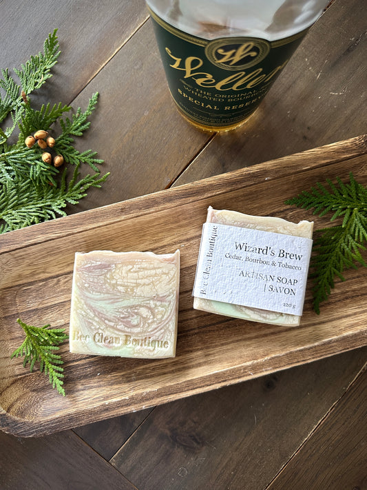 Cedar, bourbon and tobacco artisan soap on a wooden tray