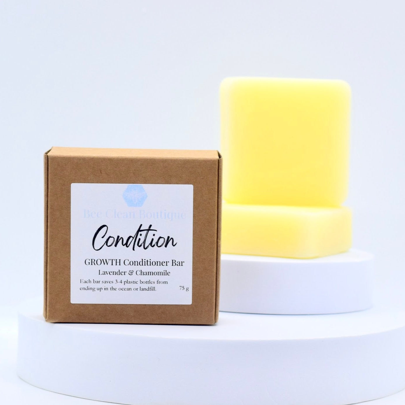 Growth conditioner bars on display; a labeled kraft box is featured